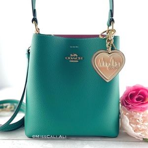 NWT COACH x JENNIFER LOPEZ Keyring Charm + Small Town Bucket Crossbody Bag Set